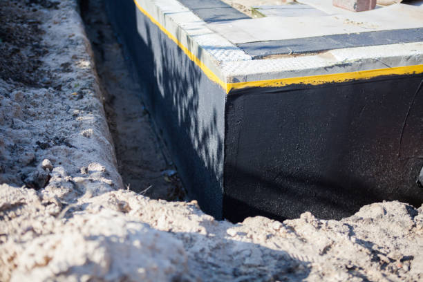 Professional Waterproofing technician working in Markle, IN